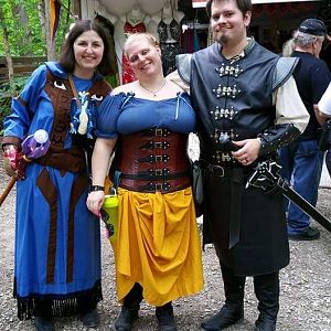 Myself with friends at the St. Louis Renaissance Faire in 2015, holding the Staff of the Four (wizard epic)

...and an Iron Man gauntlet, which is a