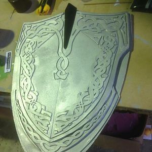 I created the shield with craft foam and patience. I did take a casting should anyone want one - PM me to organise
