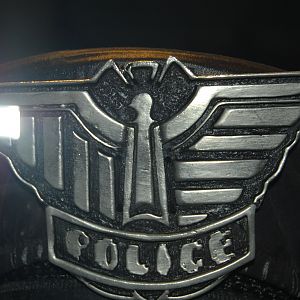 police man cap/helmet and badge