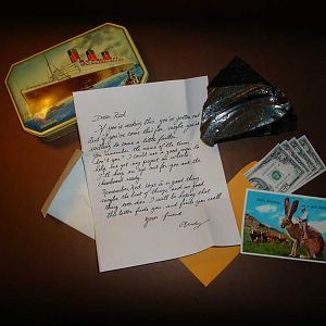 Paper props from KurtyBoy along with the vintage tin I found,and a large chunk of volcanic glass (Obsidian)